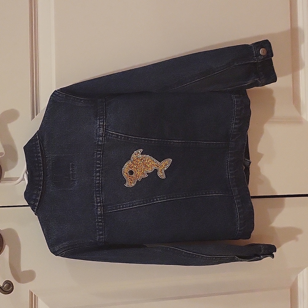 Levi's kids denim jacket with little gold dolphin on the back